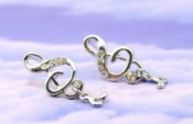 Cheap silver note with crystal setting stud earrings  