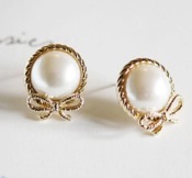 Cheap  bowknot with pearl setting stud earrings  