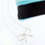 Refreshment hollow out bowknot necklace  Xl00284